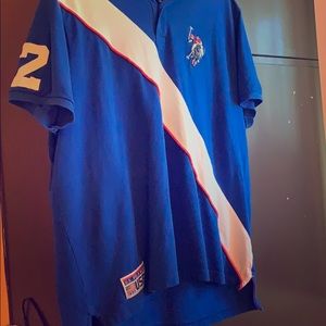 Polo all blue white and red accents